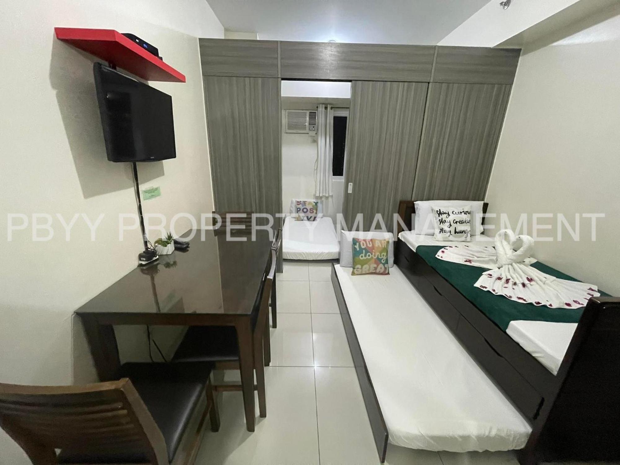 Green Residences Stays By Pbyy Manila Exteriör bild
